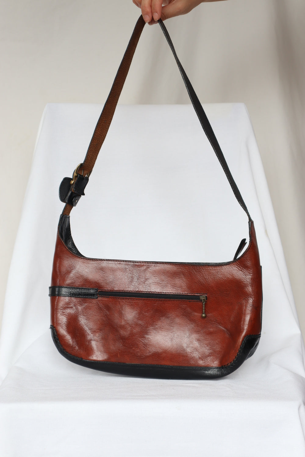 Sacoche en cuir brun et noir