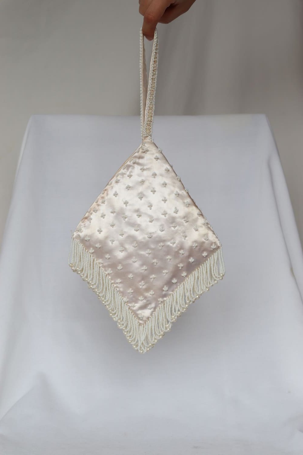 Pochette bracelet perlé