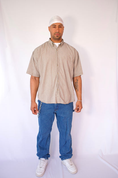 CHEMISE À MANCHES COURTES À CARREAUX BEIGE ET NOIR
