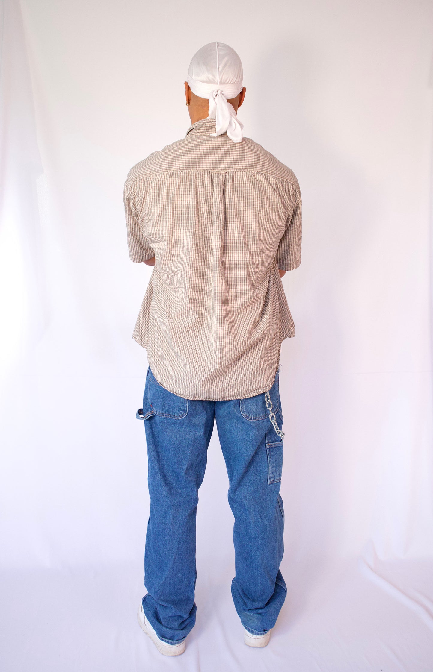 CHEMISE À MANCHES COURTES À CARREAUX BEIGE ET NOIR