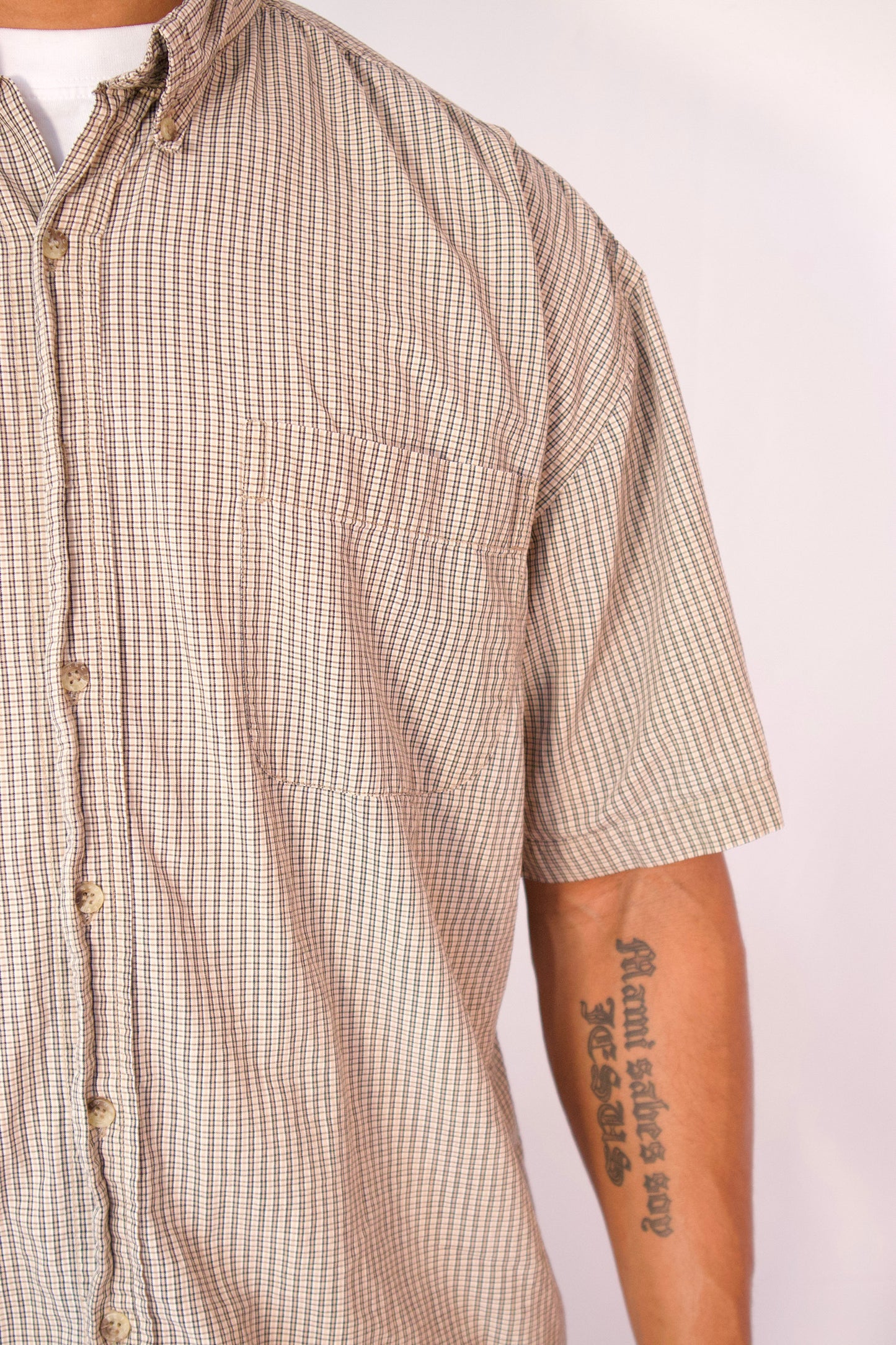CHEMISE À MANCHES COURTES À CARREAUX BEIGE ET NOIR