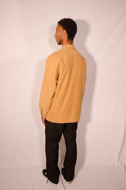 Vue de dos manteau beige longueur mi-cuisse à longue
