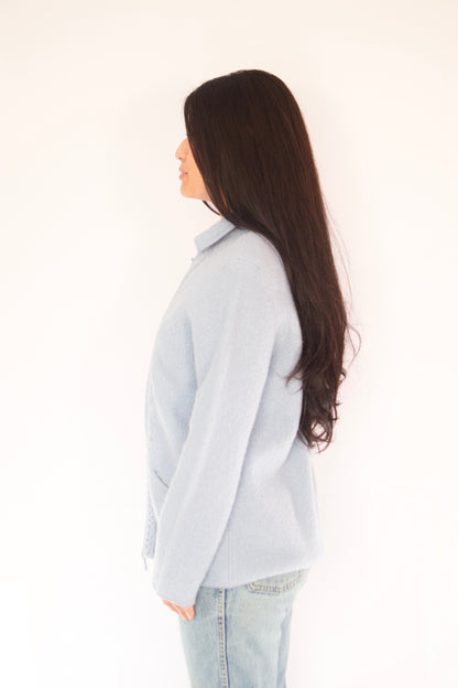 veste bleu pâle vue de profil