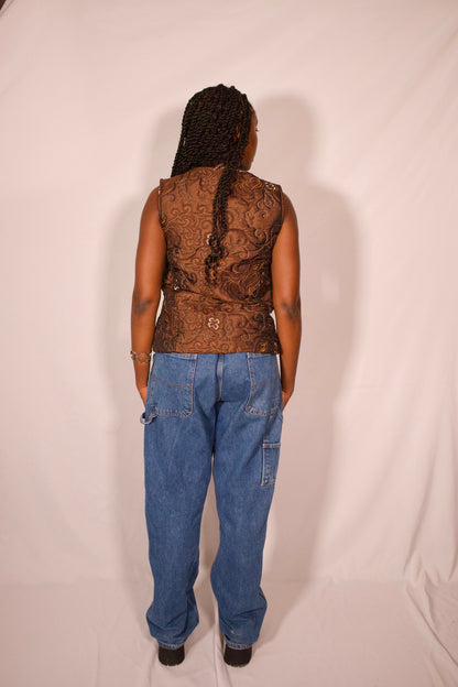 veste brune sans manches vue de dos
